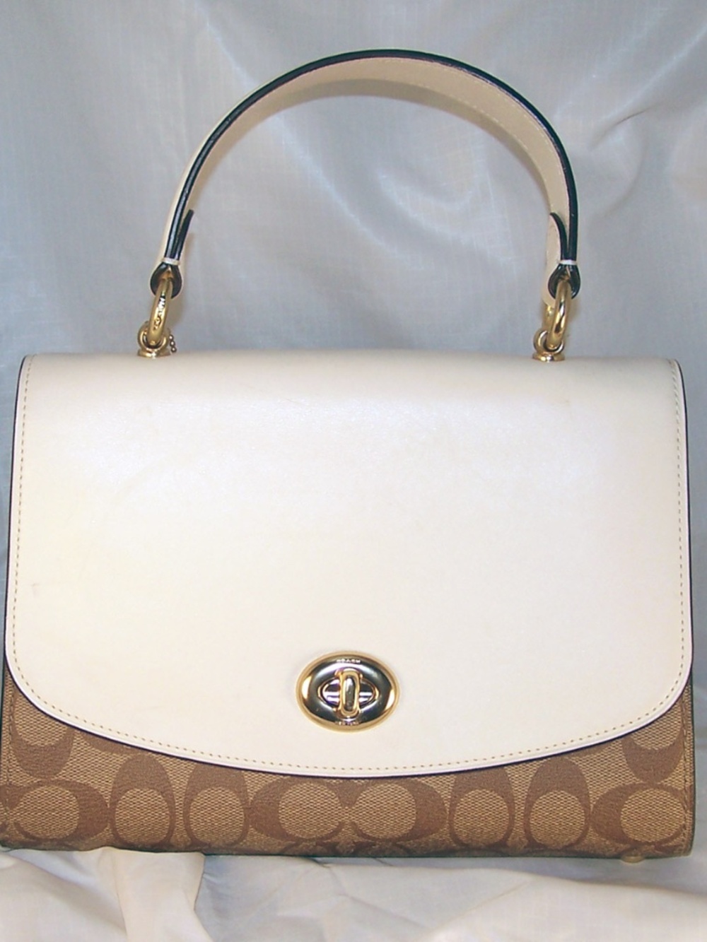 Coach Signature coated canvas and smooth leather